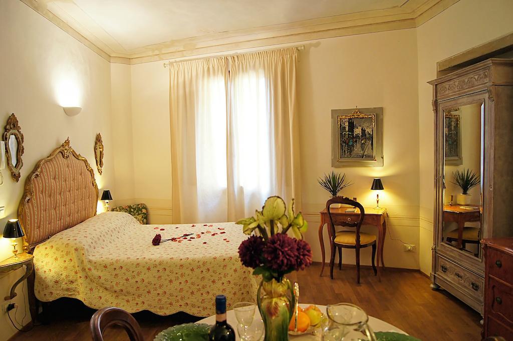 Melarancio Apartments Firenze Szoba fotó