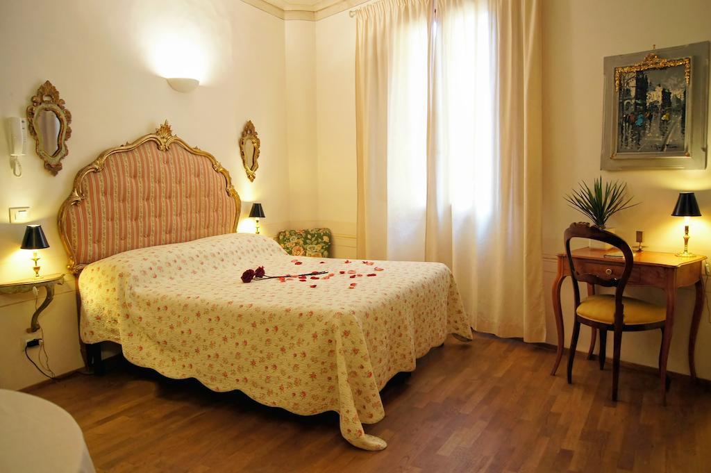 Melarancio Apartments Firenze Szoba fotó