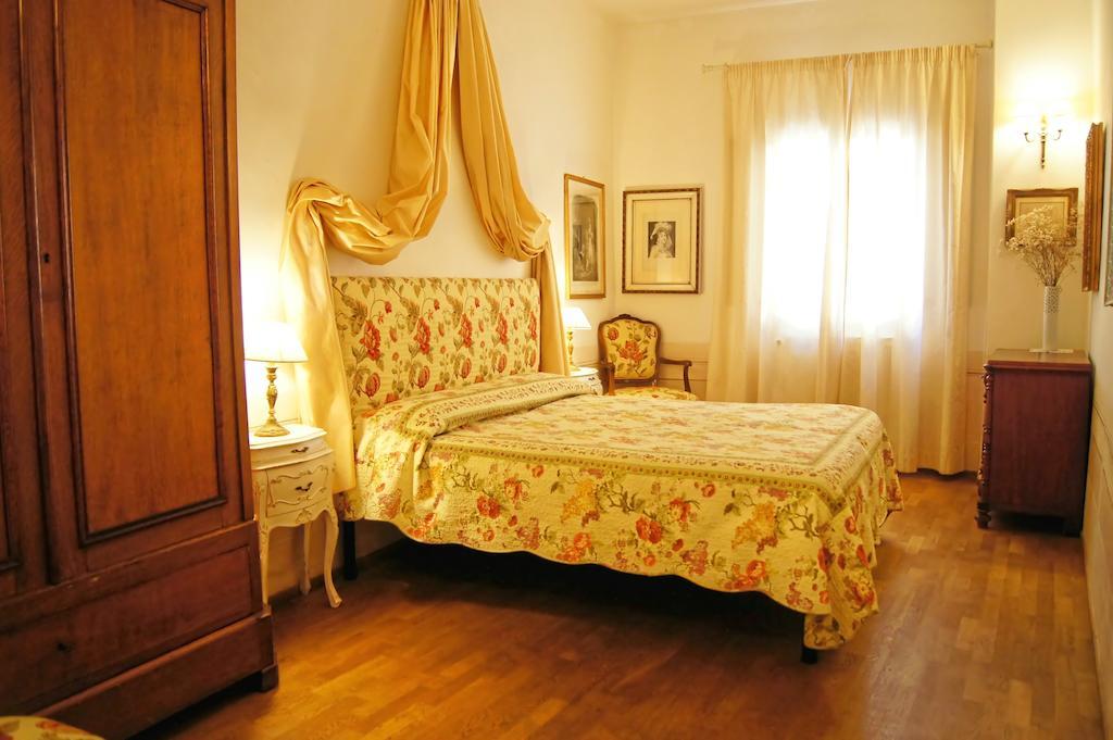 Melarancio Apartments Firenze Szoba fotó